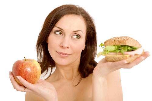 Woman eating a burger, fast food