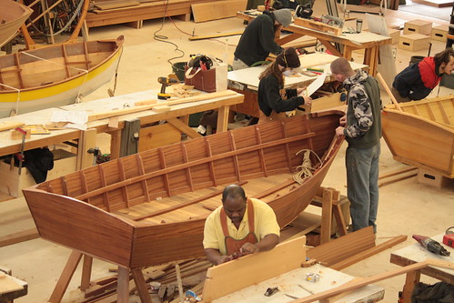 IMG_8458 - Port Hadlock WA - Northwest School of Wooden Boatbuilding - Instructor Ernie Baird - Nelson D Gillett Beachcomber-15 - student Mussa at work making a thwart (foreground)