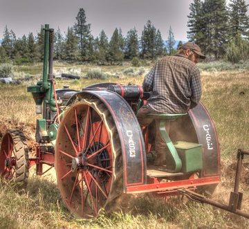 Willie and son running plow with antique Case tractor HDR