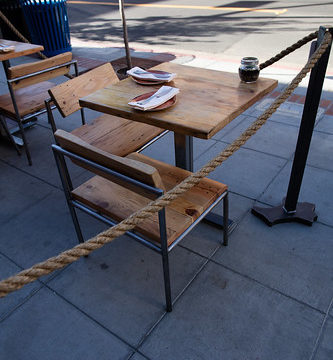 Roped-off wooden table