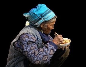 China - Dali - Old Woman Eating Noodle Soup - 1d