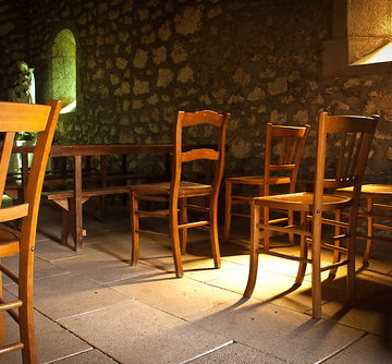 chairs in a pool of light, la chapelle sainte-foy.