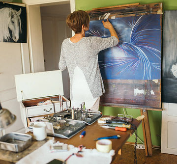 Artist Painting In The Studio