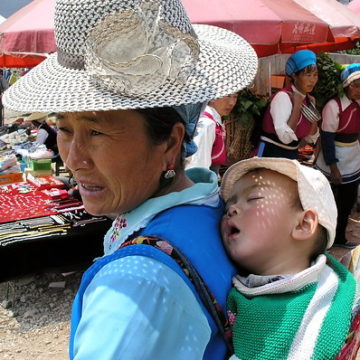 China - Dali - Market - Woman With Sleeping Child