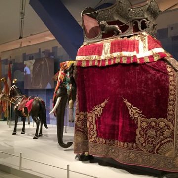 Beautiful wooden horses and elephant or olifant with a cover blanket and Howdah for riding on the back of a olifant at the India exhibition in the ROM , Royal Ontario Museum , Toronto , Ontario , Canada , Martin’s photographs , April 4. 2019