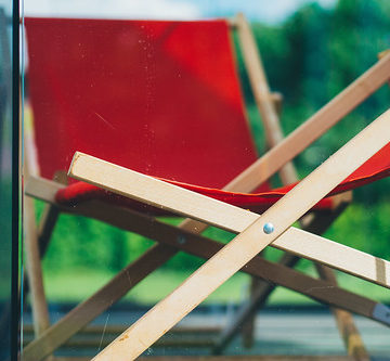 red wooden garden chairs