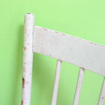 green chair and wall