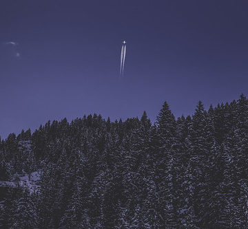 Plane over the Mountains
