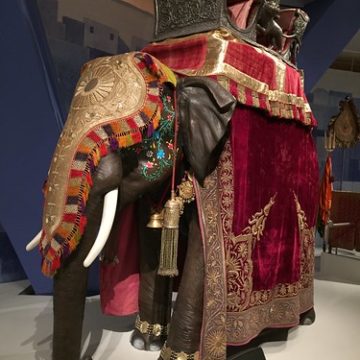 Beautiful wooden elephant or olifant with a cover blanket and Howdah for riding on the back of a olifant at the India exhibition in the ROM , Royal Ontario Museum , Toronto , Ontario , Canada , Martin’s photographs , April 4. 2019